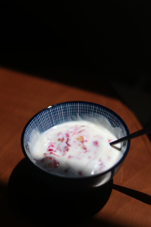 Fruit yogurt in blue bowl