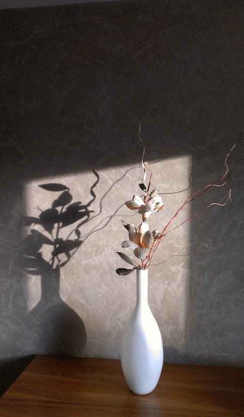 White Ceramic Vase with Flower