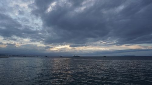 Free Dark clouds and calm sea during twilight in Solomon Islands, capturing serene ocean atmosphere. Stock Photo