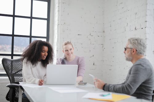 Photo Of People Having Conversation