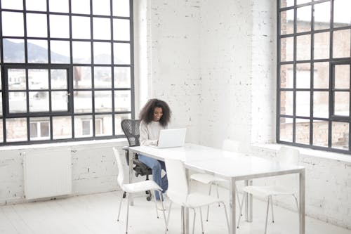 Photo Of Woman Using Laptop