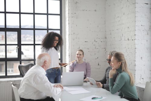 Free Photo Of People Having Discussion Stock Photo
