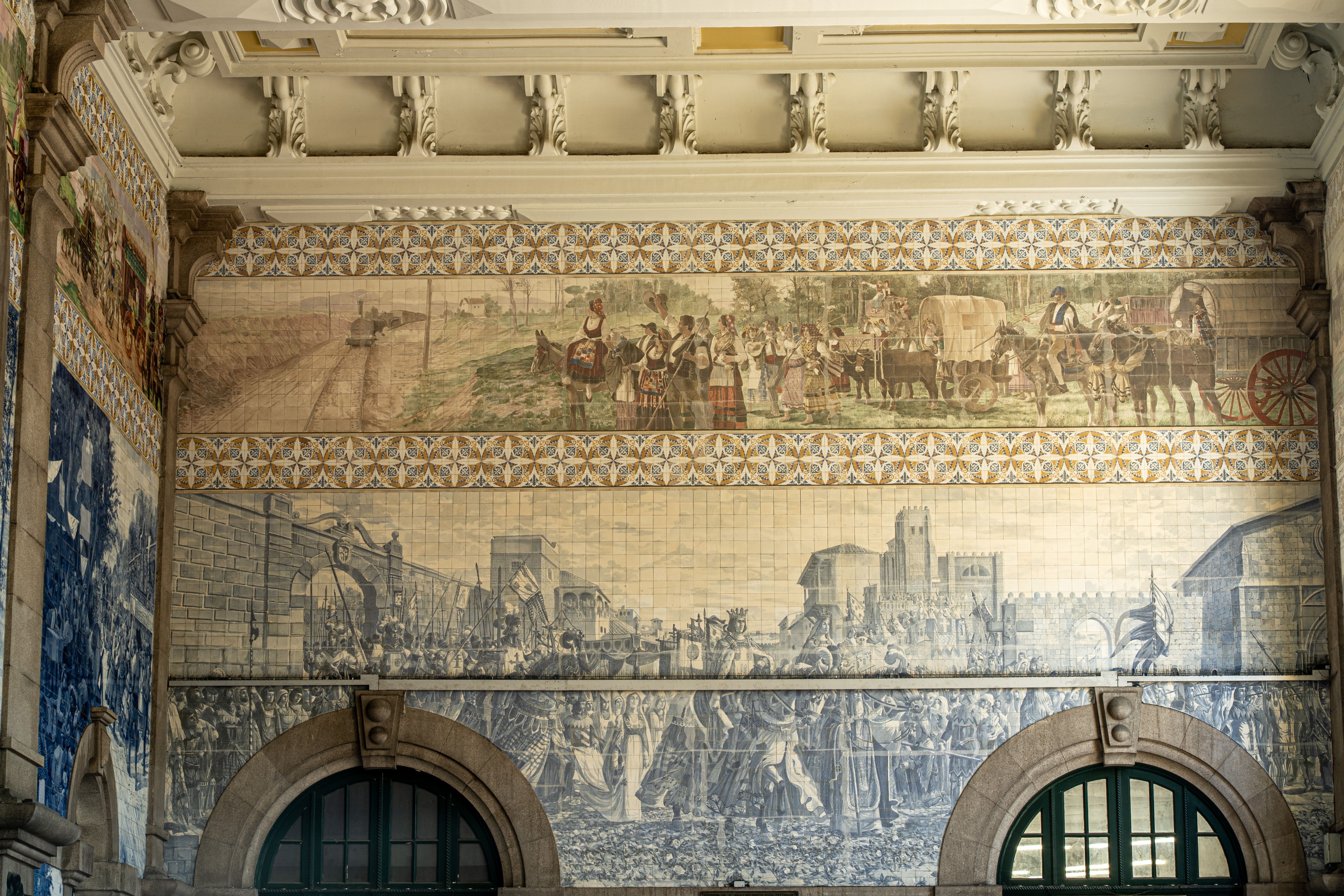 The blue and white tiled entrance hall of Sao Bento railway station in Porto