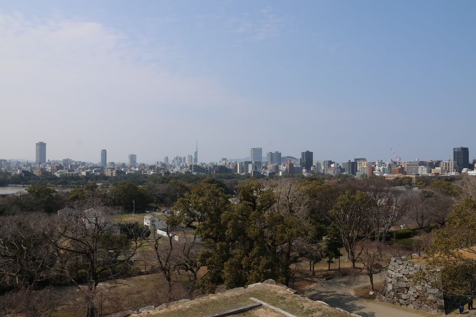 A scenic view of Fukuoka city skyline from Fukuoka Castle during daytime.