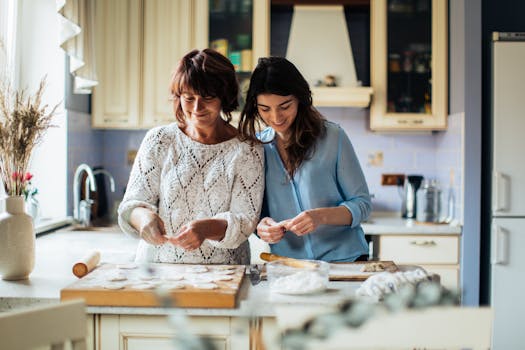 A mother and daughter enjoy preparing traditional dumplings in a cozy kitchen setting.