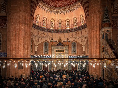 Free The stunning interior of Selimiye Mosque in Edirne, Türkiye, filled with worshippers during prayer. Stock Photo