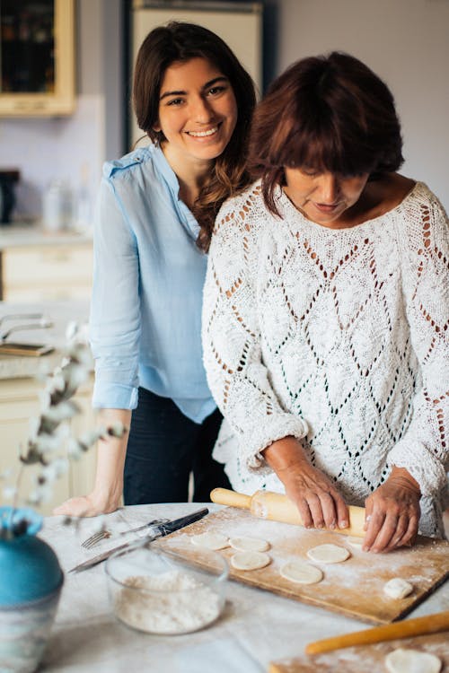 Photo Of Woman Using Rolling Pin 