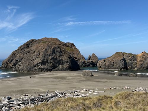 Free Stunning view of rocky formations along the Oregon coast under a clear blue sky. Stock Photo