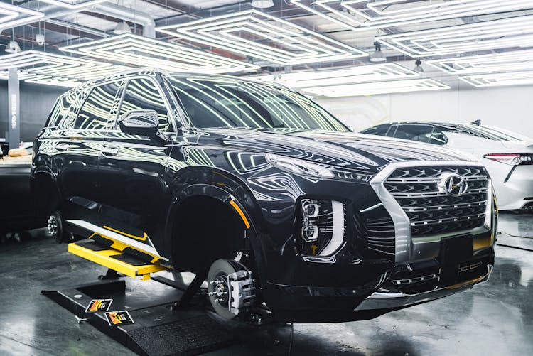 Black Hyundai Palisade Car In A Garage