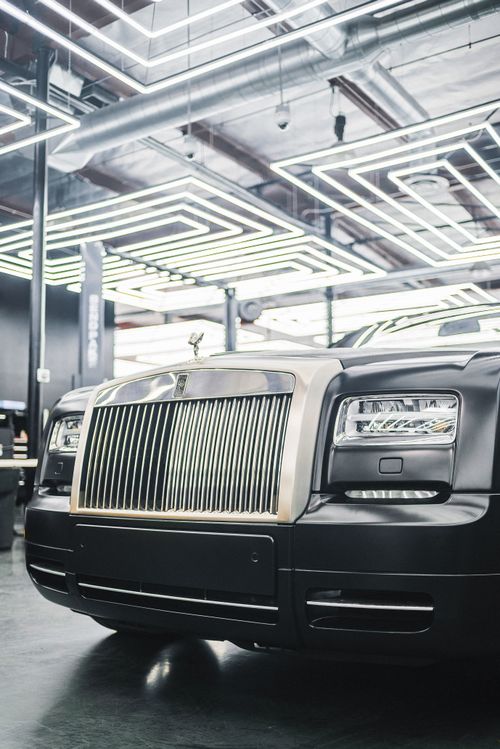 Free Close-up of a Rolls-Royce showcasing elegant design at a modern car exhibition. Stock Photo