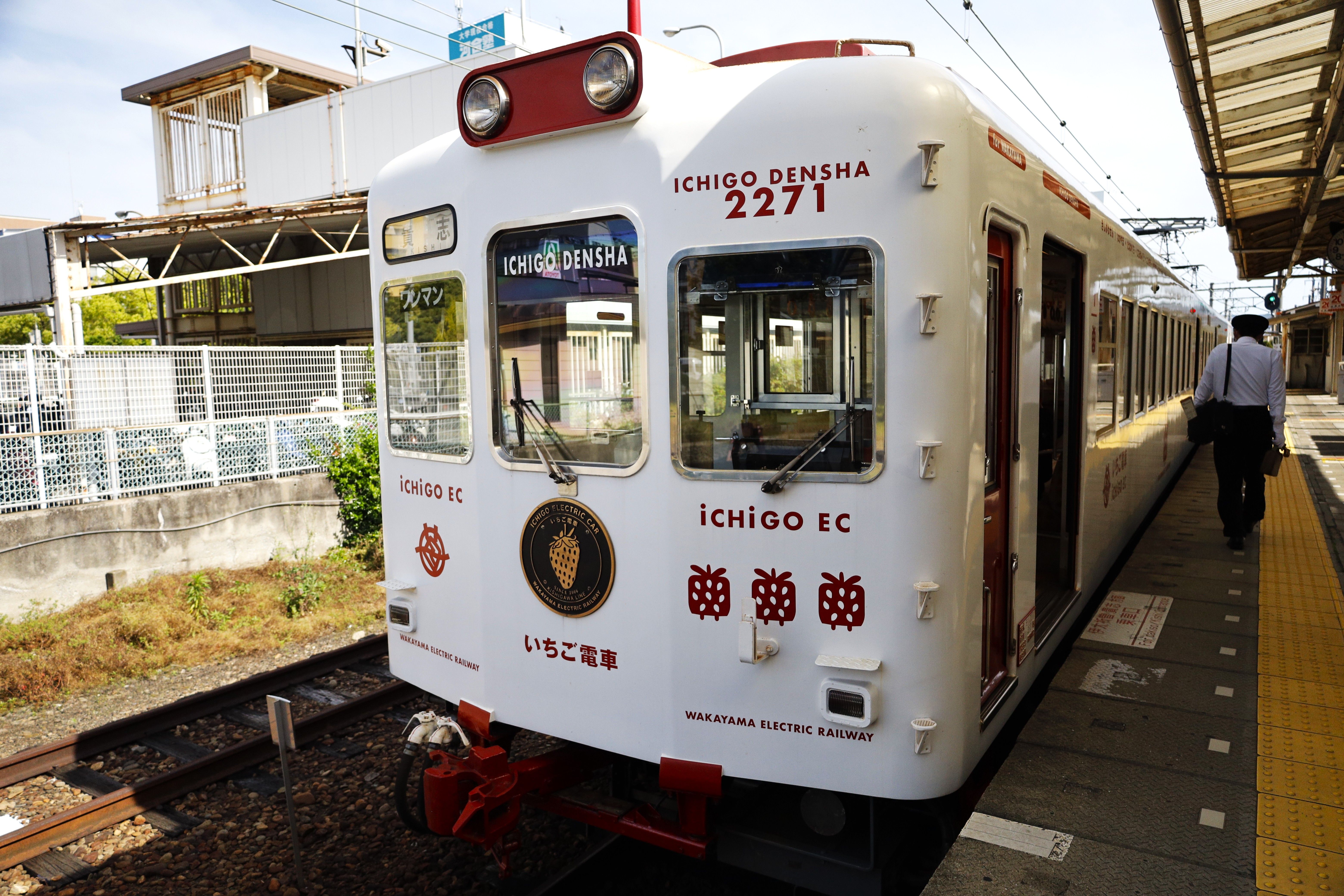 Themed Ichigo Densha train at Wakayama station in Japan, offering a unique travel experience.