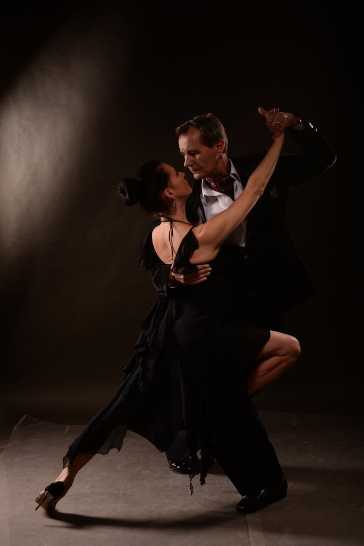 Man And Woman Dancing On Stage