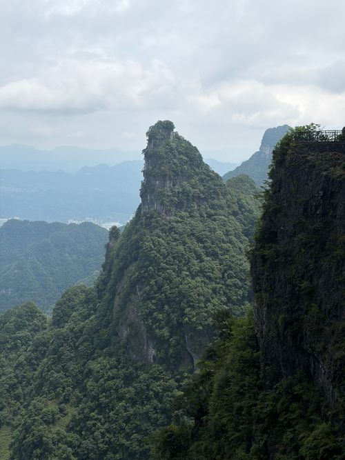 Free Stunning view of Zhangjiajie's lush green karst mountains on a cloudy day. Stock Photo