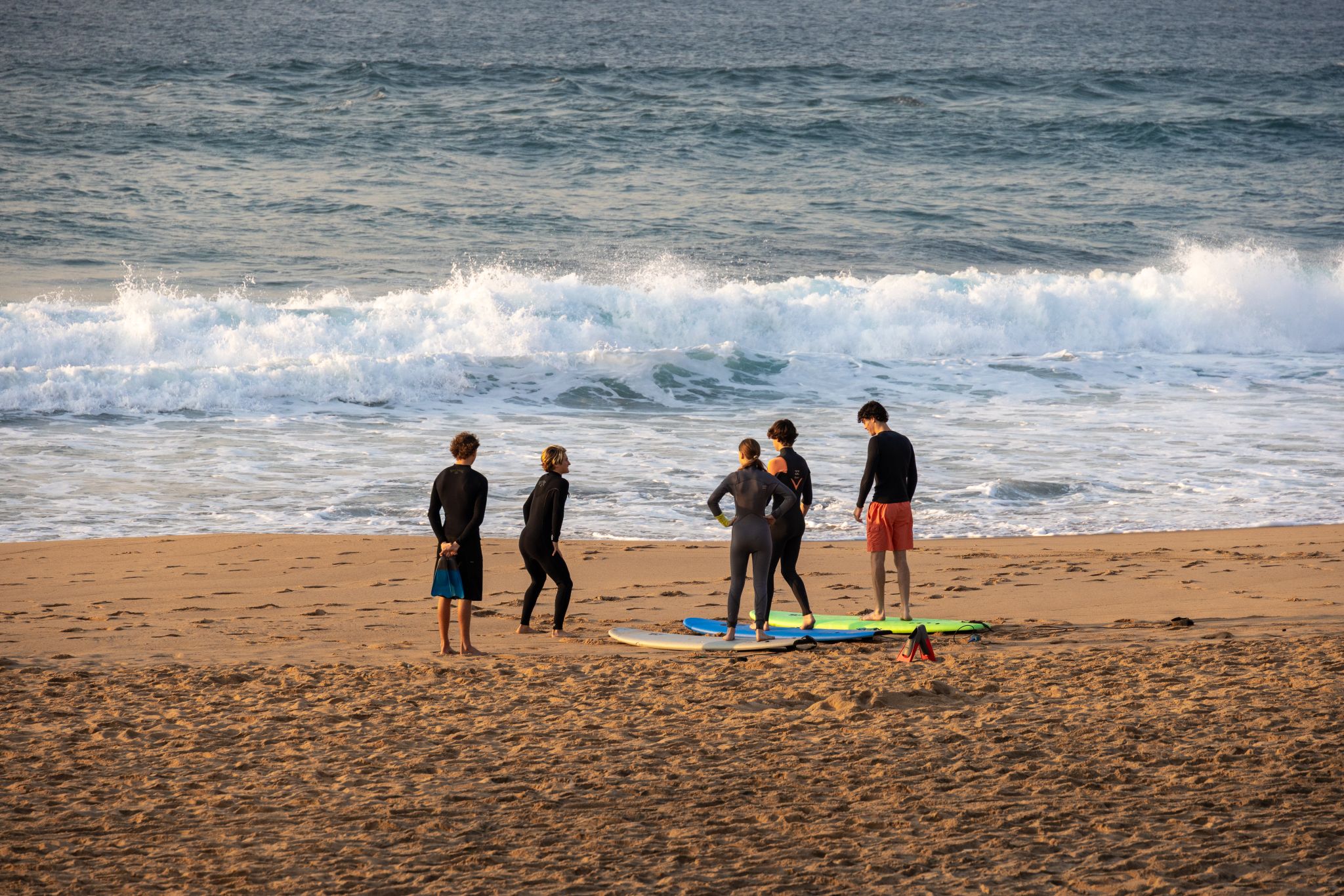 Surfer catching a small wave