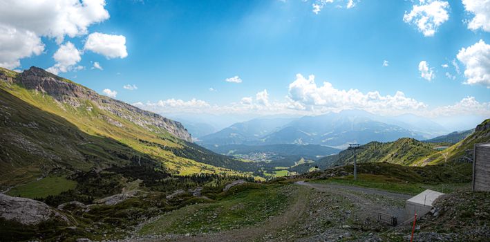 Panoramic view of the majestic Alpine mountains from Flims, Graubünden, Switzerland during summer.