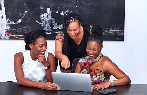 Free Three Women Looking At The Computer Stock Photo