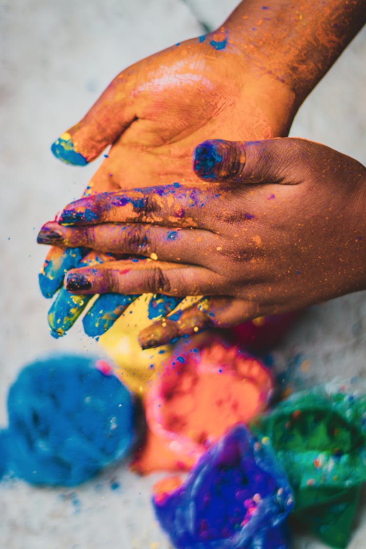 Hands Covered In Colored Powder