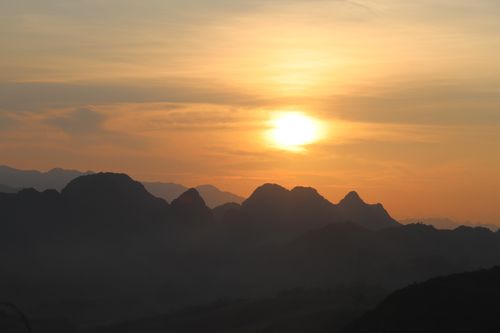 Free Stunning sunset view over the misty mountains of Hoa Binh, Vietnam. Stock Photo