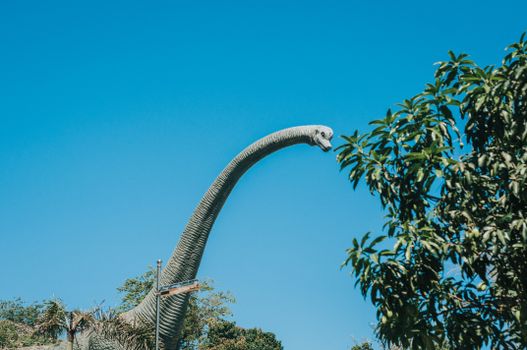 Dinosaur Attraction Under Blue Sky