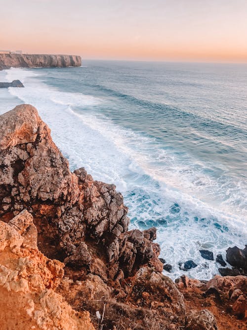 Brown Rock Formation Near Sea