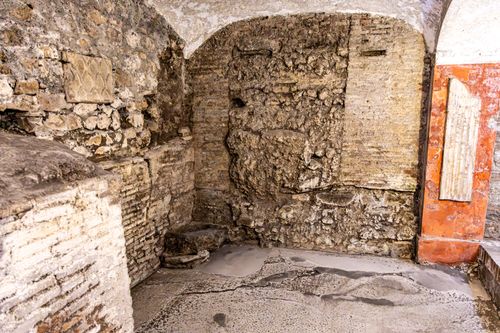 Free Explore ancient Roman ruins in an underground site in Rome, Italy. Stock Photo
