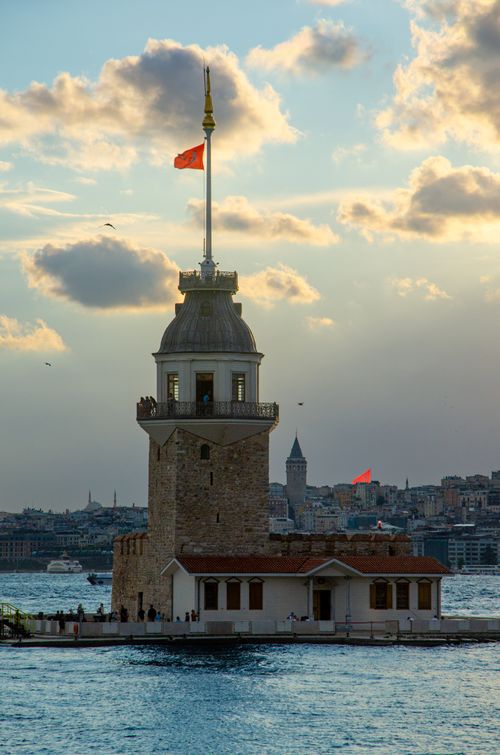 Free Scenic view of Maiden's Tower during sunset in Istanbul, Turkey, capturing a warm and serene atmosphere. Stock Photo