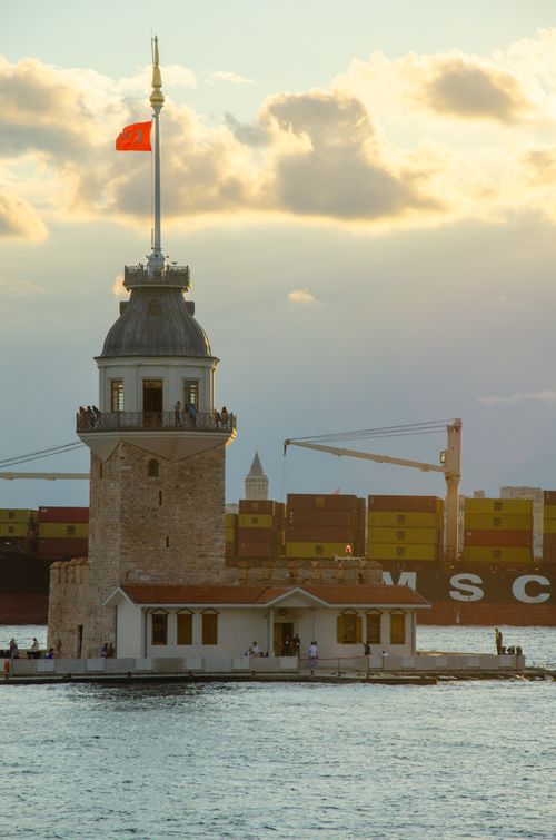 Free Scenic view of Maiden's Tower during sunset with a ship in the background, İstanbul. Stock Photo