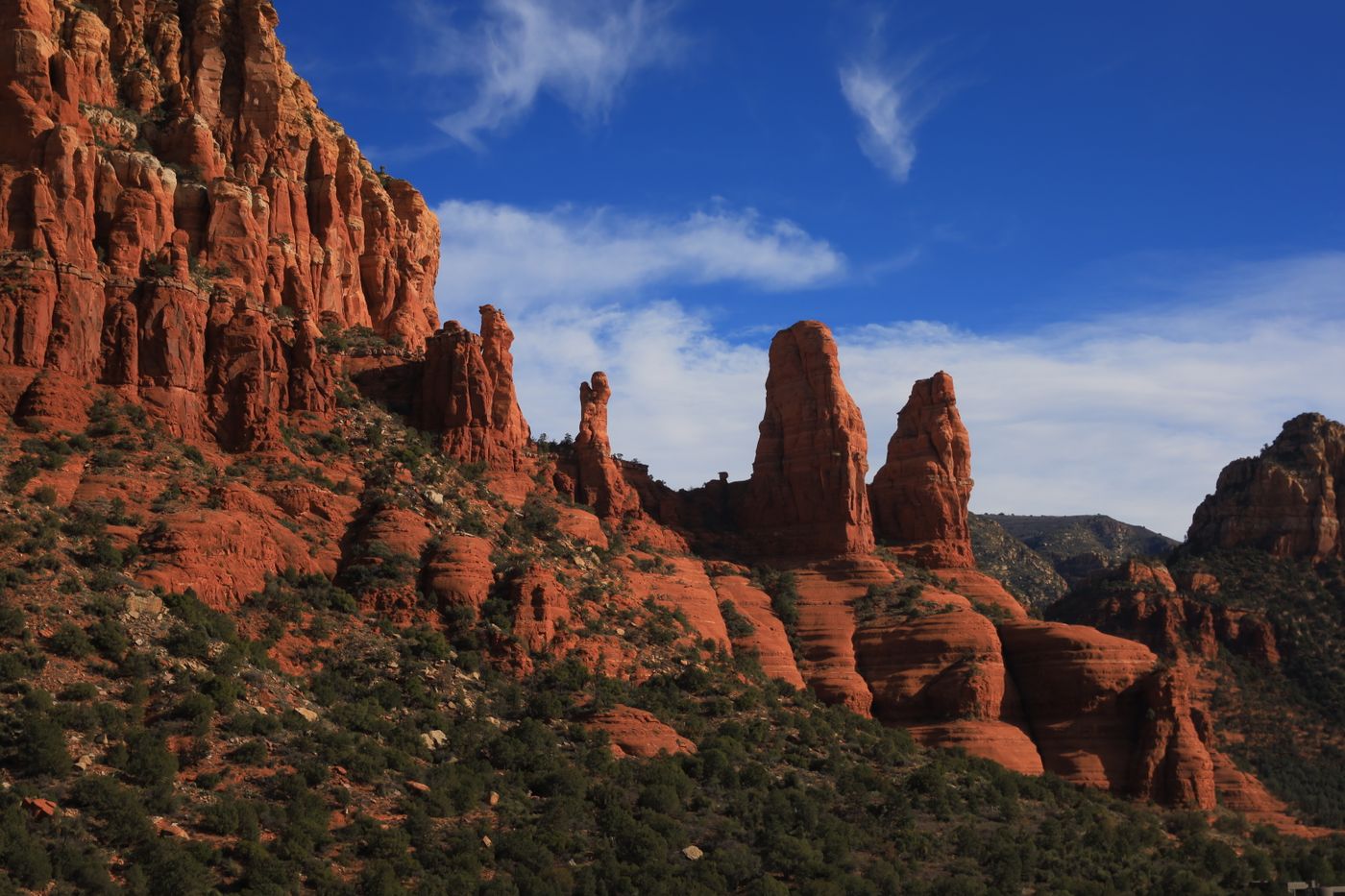 Red rock formations under a blue sky in Sedona, Arizona