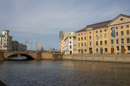 Free Sunlit view of historic buildings and waterfront in Gothenburg, Sweden's vibrant cityscape. Stock Photo