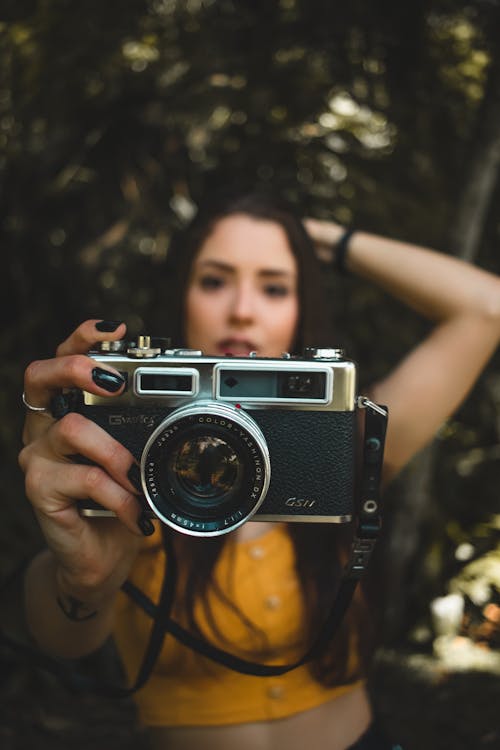 Free Person Holding Black And Silver Camera Stock Photo