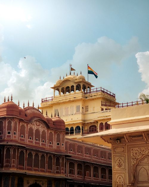 Free City Palace in Jaipur, Rajasthan, showcasing Indian architecture and culture under a bright blue sky. Stock Photo