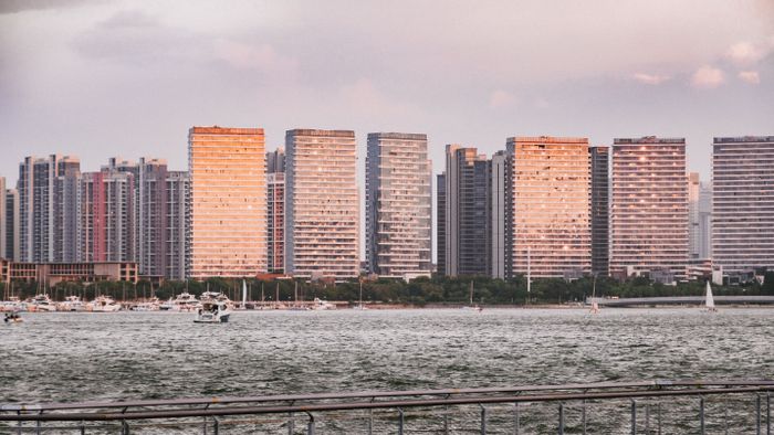 Sunset reflection on Xiamen's waterfront skyscrapers