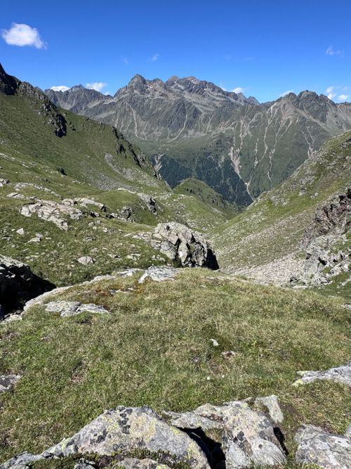 Free Scenic mountain landscape in Tyrol, Austria showcasing rugged peaks and lush valleys under clear blue skies. Stock Photo