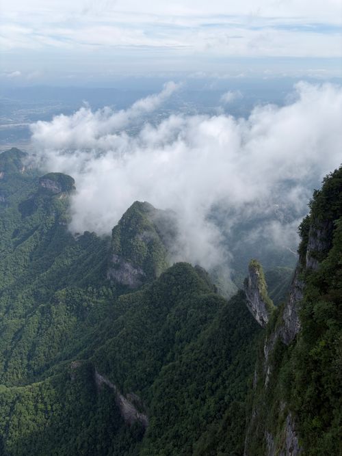 Free Captivating aerial view of misty mountains at Zhangjiajie National Forest Park, Hunan, China. Stock Photo