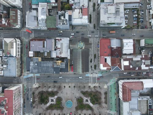 Free Aerial shot capturing the grid pattern streets and urban landscape of Valdivia, Chile. Stock Photo