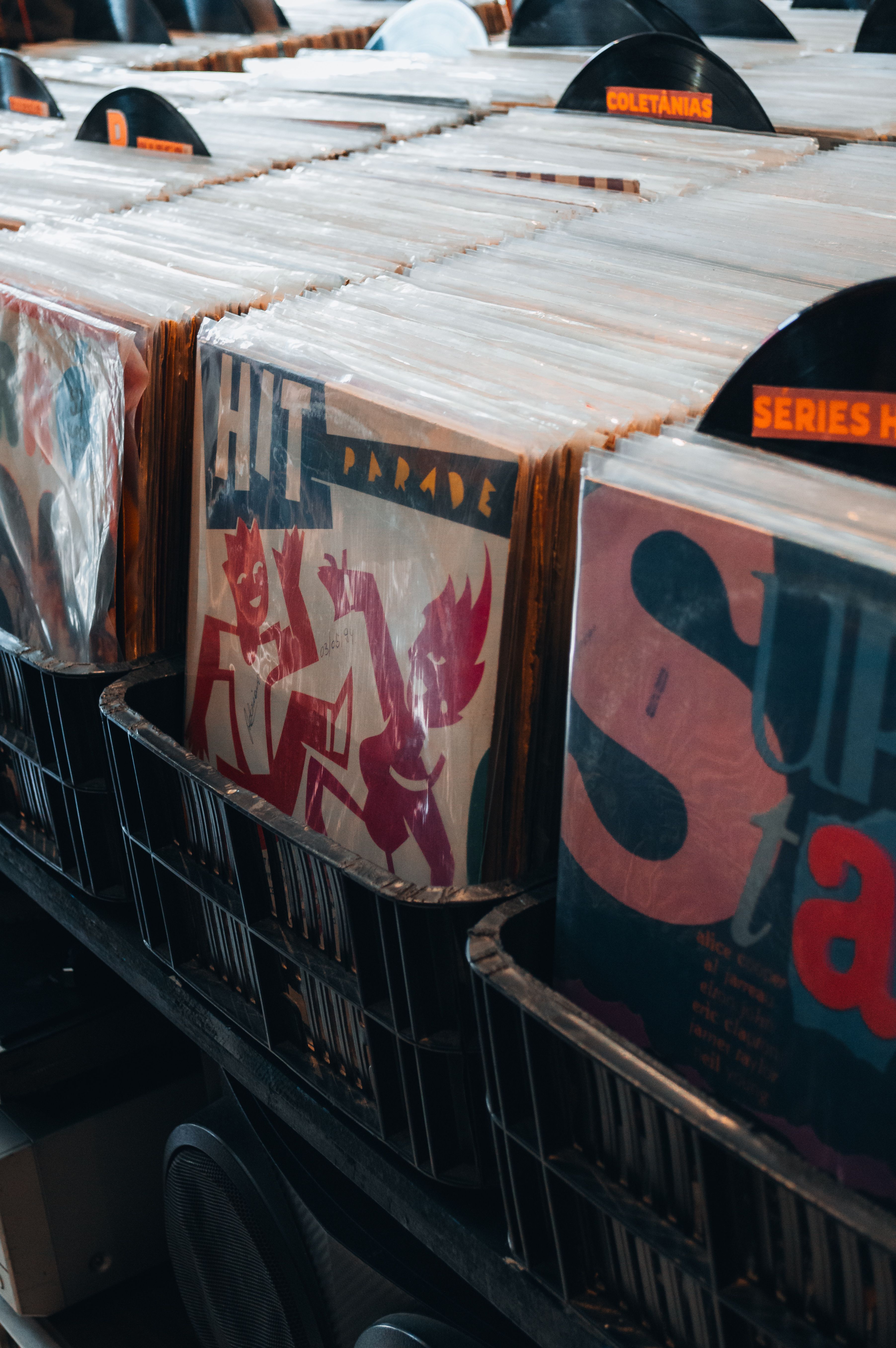 Vintage vinyl records on display in a record store in Brazil, showcasing diverse music genres.
