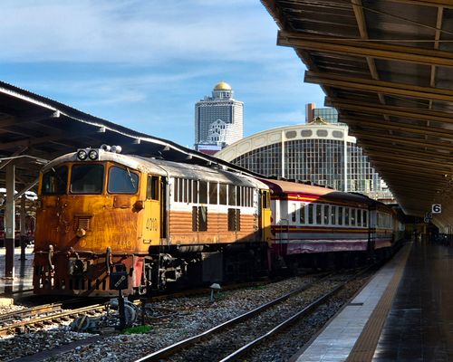 Free A vintage train at Hua Lamphong Station in Bangkok on a sunny day. Stock Photo
