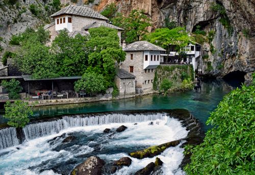 Free Captivating view of Blagaj Tekija monastery by the Buna River, surrounded by nature. Stock Photo