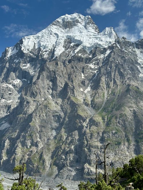 Free Stunning view of a snow-capped Himalayan mountain under a clear blue sky. Stock Photo