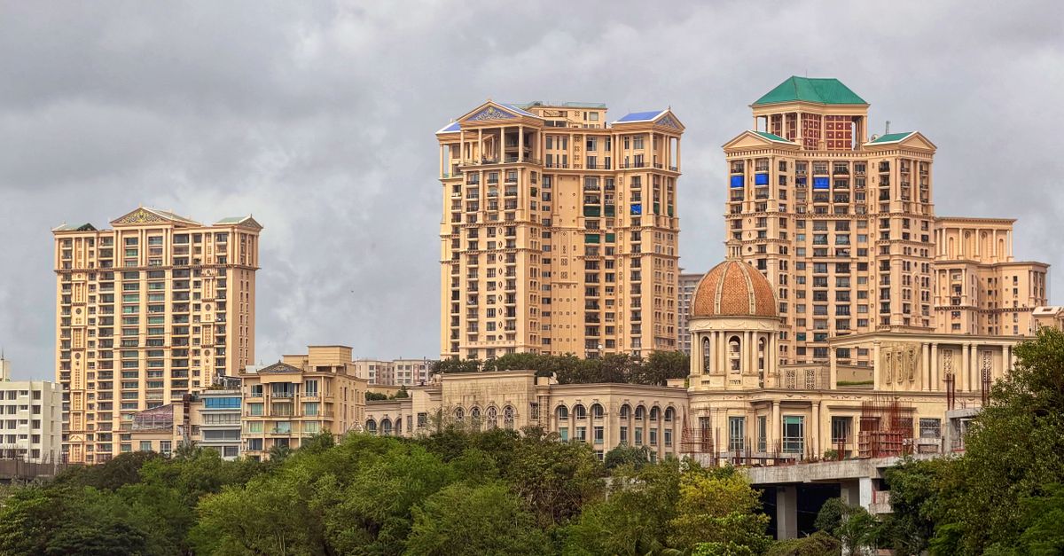 Captivating view of Hiranandani complex towering over lush greenery in Mumbai, India.