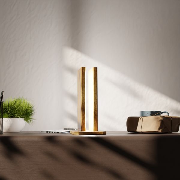 Brass desk lamp on a walnut workspace — photo by Puscas Adryan on Pexels