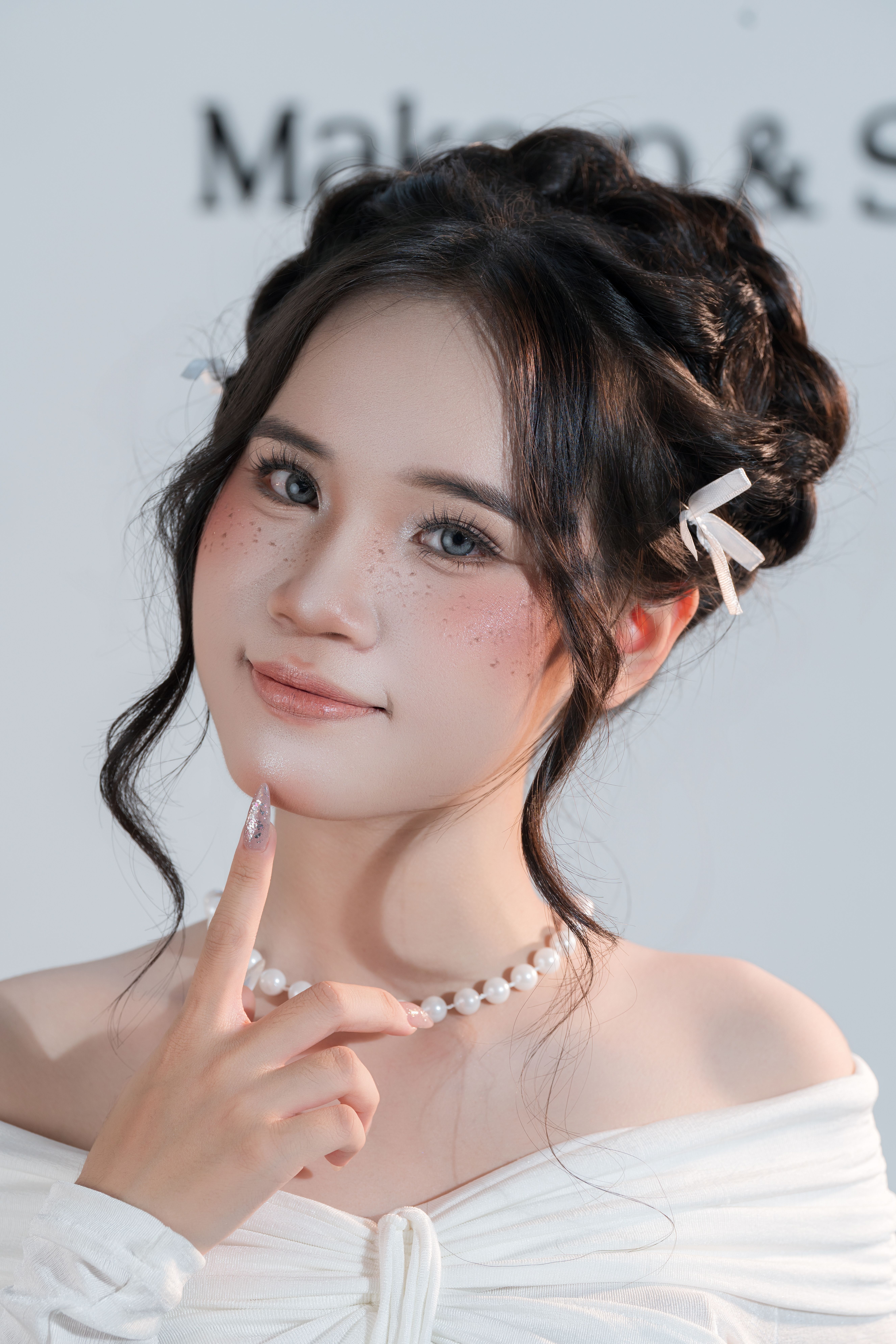 Elegant Portrait of a Woman with Braided Hairstyle · Free Stock Photo