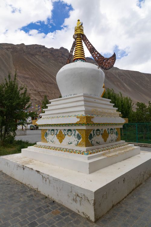 Free A vibrant stupa set against the rugged mountain backdrop of Spiti Valley, India. Stock Photo