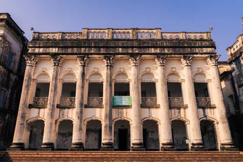 Free A striking view of an ancient colonial building with arches in Manikganj, Bangladesh. Stock Photo