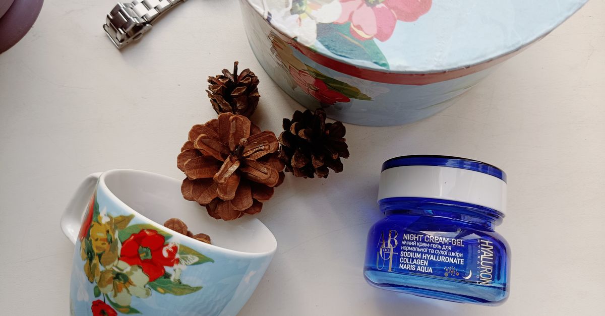 Floral-themed cozy flat lay with night cream, pine cones, and a floral cup. - Evidence evidence guide for sodium hyaluronate skin hydration randomized trial