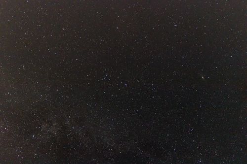 Free Stunning view of a star-filled night sky featuring the Milky Way galaxy. Stock Photo