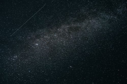 Free Starry night sky featuring a clear view of the Milky Way galaxy over England's countryside. Stock Photo