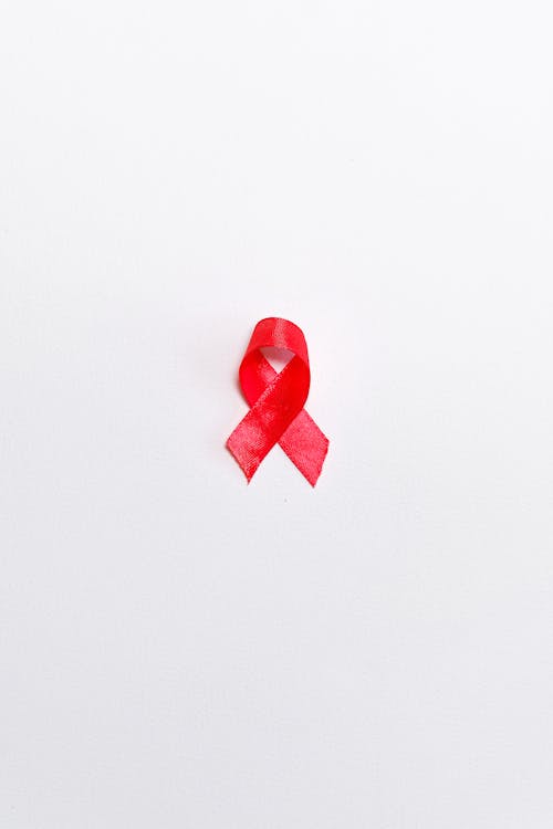 Red Ribbon on White Surface