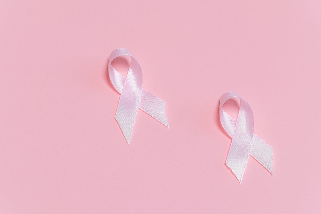 Free Pink Ribbons on Pink Surface Stock Photo