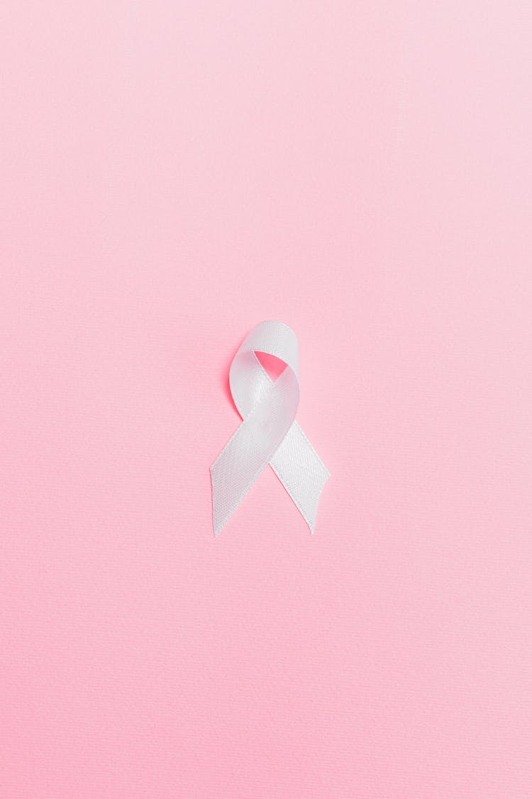 Pink Ribbon On Pink Surface